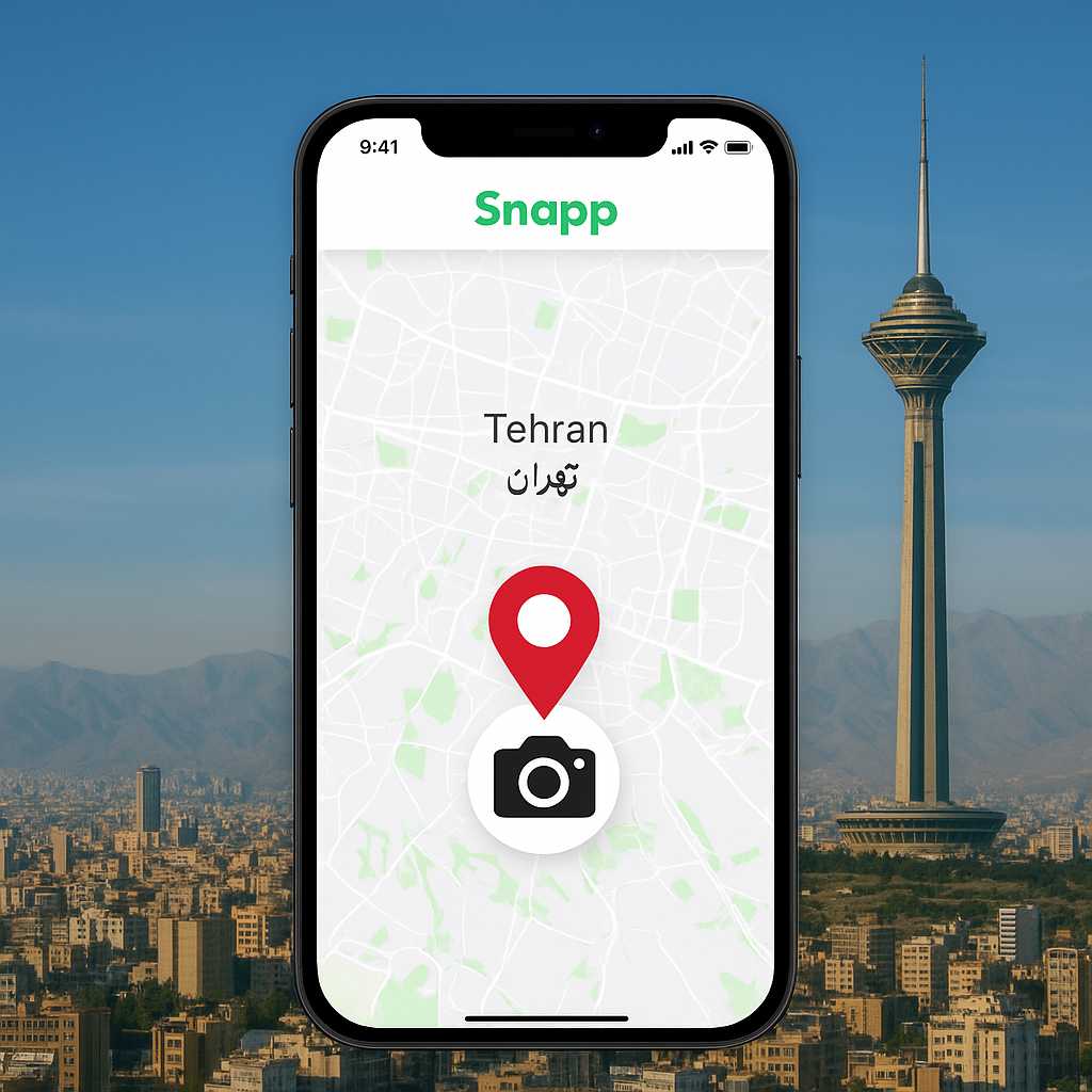 نمایی از نقشه اسنپ روی گوشی موبایل با نشانگر موقعیت آتلیه در تهران و برج میلاد در پس‌زمینه